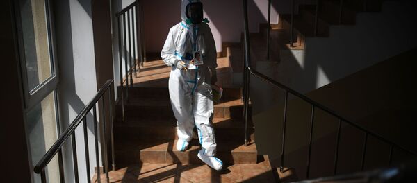 Врач в госпитале COVID-19 - Sputnik Таджикистан