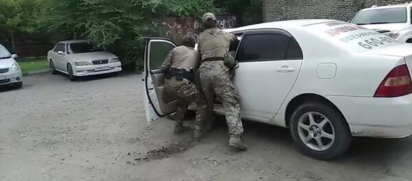 Спецоперация по предотвращению теракта в Хабаровске. Съемка ФСБ РФ Спецоперация по предотвращению теракта в Хабаровске. Съемка ФСБ РФ - Sputnik Таджикистан