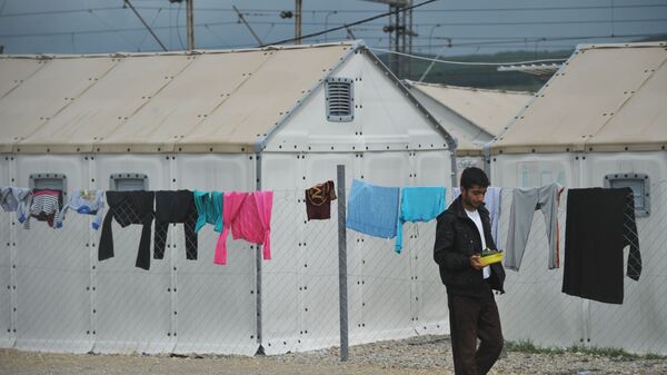 Лагерь беженцев Табановце в Македонии около македоно-сербской границы - Sputnik Тоҷикистон
