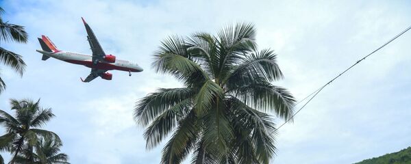На месте крушения пассажирского самолета Boeing 737 Air India Express в индийском городе Кежикоде, штат Керала, Индия - Sputnik Тоҷикистон