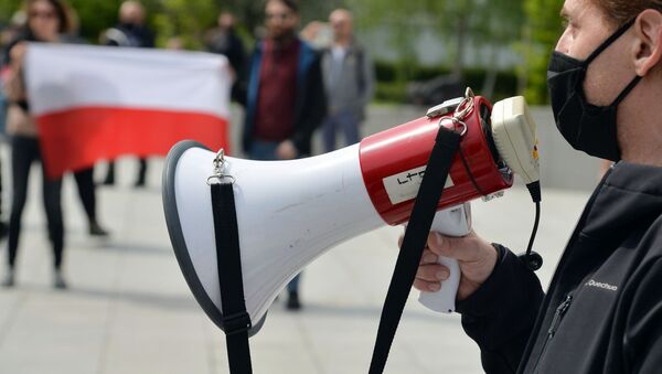 Первомайские демонстрации в Варшаве и Бейруте - Sputnik Таджикистан