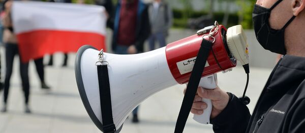 Первомайские демонстрации в Варшаве и Бейруте - Sputnik Таджикистан