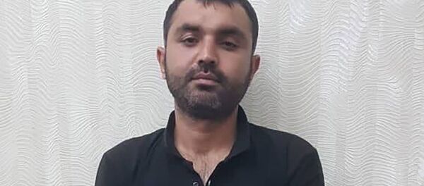 Яке аз муттаҳамон дар ғорати мағозаҳои бозори Фаровон - Sputnik Тоҷикистон