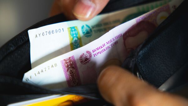Кошелек с деньгами, архивное фото - Sputnik Таджикистан