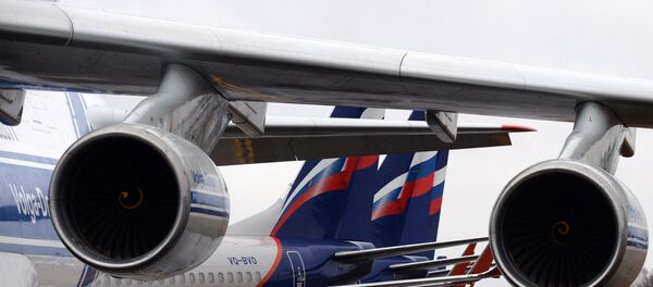 Тяжёлый дальний транспортный самолёт Ан-124-100 Руслан авиакомпании Волга-Днепр Тяжёлый дальний транспортный самолёт Ан-124-100 Руслан авиакомпании Волга-Днепр - Sputnik Таджикистан