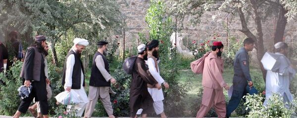 ОСвобожденные из тюрьмы боевики Талибана ОСвобожденные из тюрьмы боевики Талибана - Sputnik Таджикистан