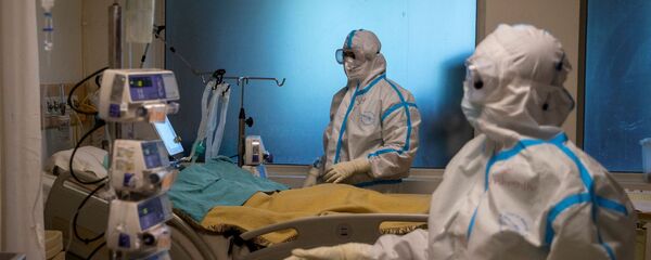 Лечение больных с коронавирусом - Sputnik Тоҷикистон