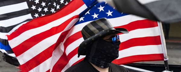 Акция сторонников Д. Трампа в Портленде Акция сторонников Д. Трампа в Портленде - Sputnik Таджикистан