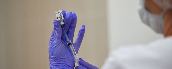 Вакцинация против COVID-19 в Москве - Sputnik Тоҷикистон