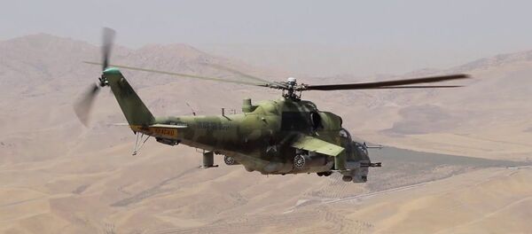 Учения экипажей вертолетов Ми-24 российской военной базы в Таджикистане - YouTube - Sputnik Таджикистан