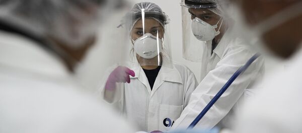 Люди в защитных масках. архивное фото - Sputnik Таджикистан