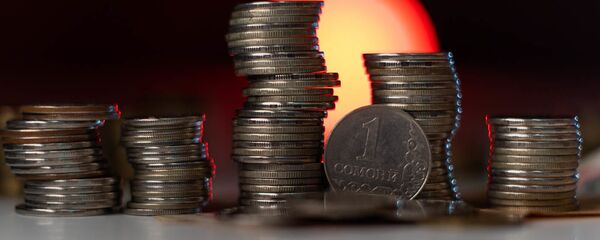 Монеты, архивное фото - Sputnik Тоҷикистон