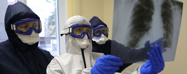 Медицинские работники ковид-госпиталя, архивное фото - Sputnik Тоҷикистон