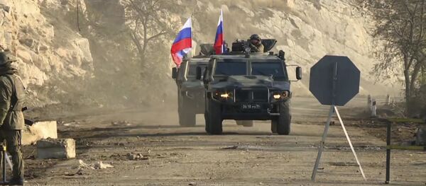 Қарабоғ: Сулҳбонони рус долони Лочинро аз минаҳо пок карданд Қарабоғ: Сулҳбонони рус долони Лочинро аз минаҳо пок карданд - Sputnik Тоҷикистон