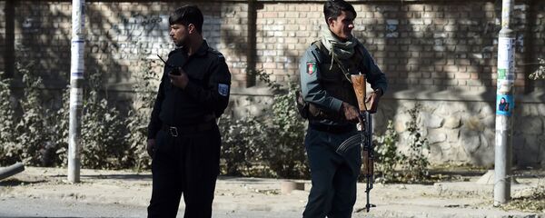 Полицейские стоят на страже возле Кабульского университета, архифное фото Полицейские стоят на страже возле Кабульского университета, архифное фото - Sputnik Тоҷикистон