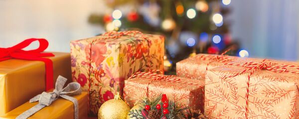 Новогодние подарки - Sputnik Тоҷикистон