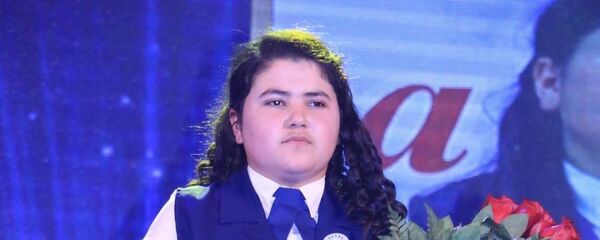 Раъно Насриддинова, барандаи шоҳҷоизаи озмуни Фурӯғ Раъно Насриддинова, барандаи шоҳҷоизаи озмуни Фурӯғ - Sputnik Тоҷикистон