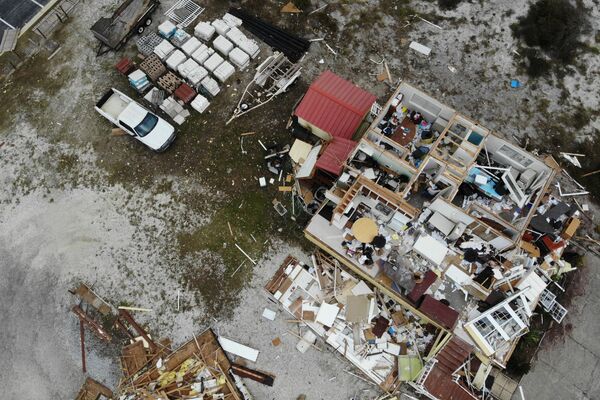 Разрушенный во время урагана Салли дом, США - Sputnik Тоҷикистон