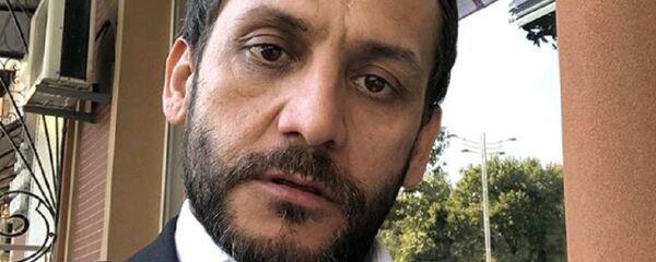 Фонтан из денег лишил Жахонгира Атаджанова лицензии - Sputnik Тоҷикистон