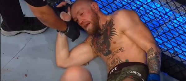 Макгрегор после боя с Порье - Sputnik Таджикистан