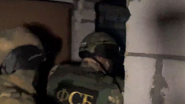 Задержание исламистов в Калужской области. Кадры ФСБ - Sputnik Таджикистан
