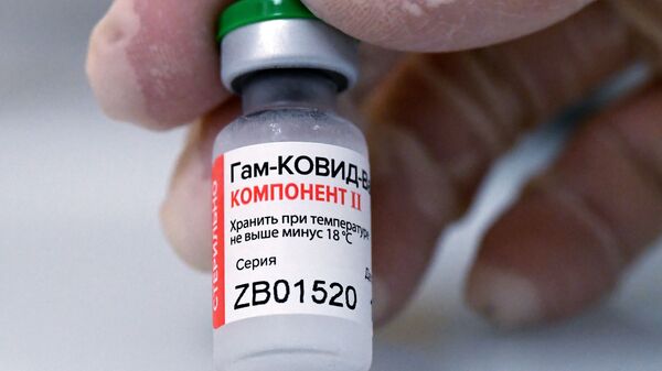 Ампула с вакциной против COVID-19 Спутник V - Sputnik Таджикистан