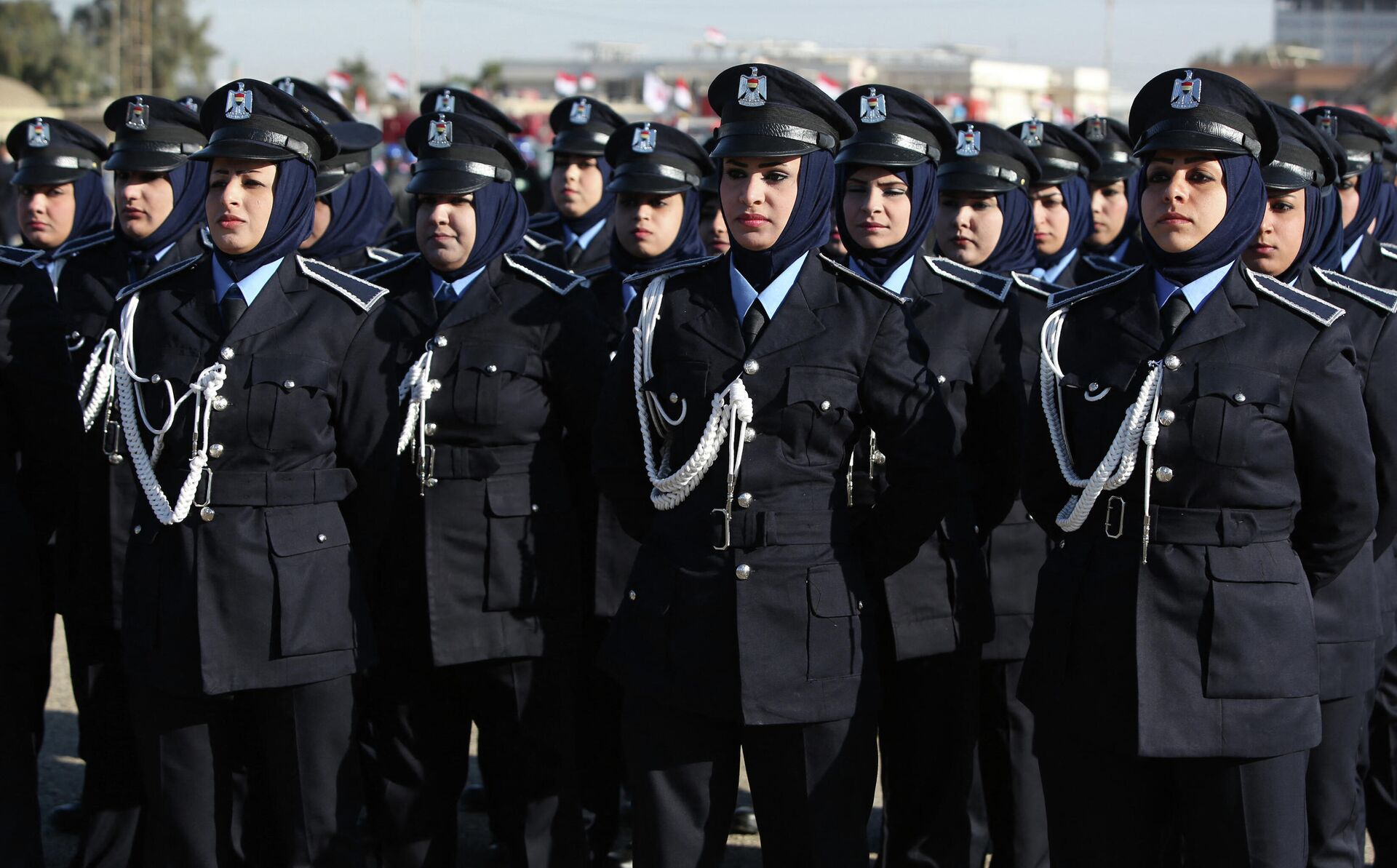 Женщины-полицейские на параде в честь 93-й годовщины образования полицейских сил в Багдаде, Ирак. - Sputnik Тоҷикистон, 1920, 16.04.2021