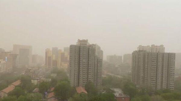 Видео РИА Новости. Песчаная буря накрыла Пекин - Sputnik Таджикистан