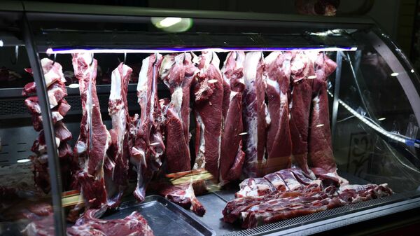 Мясо на рынке, архивное фото - Sputnik Тоҷикистон