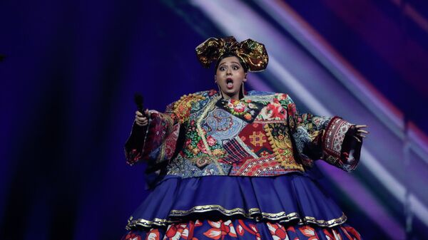 Россиянка Манижа выступает во время первого полуфинала 65-го конкурса Евровидение-2021 - Sputnik Таджикистан