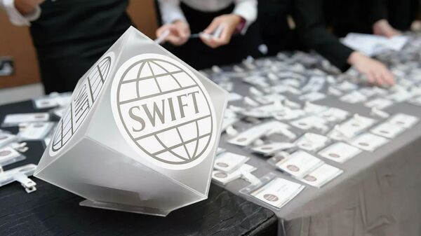 Логотип SWIFT - Sputnik Тоҷикистон