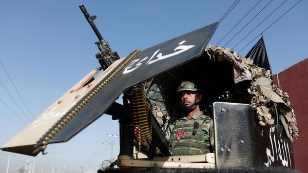 Военнослужащий афганской армии на посту в Кабуле - Sputnik Таджикистан
