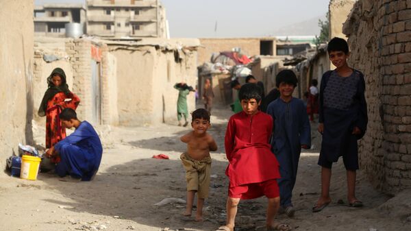 Беженцы из зоны боевых действий в Афганистане - Sputnik Таджикистан