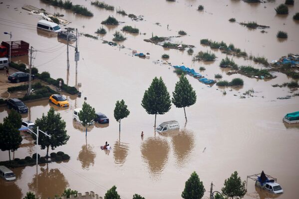 Центральную китайскую провинцию Хэнань затопило из-за сильных ливней. - Sputnik Таджикистан