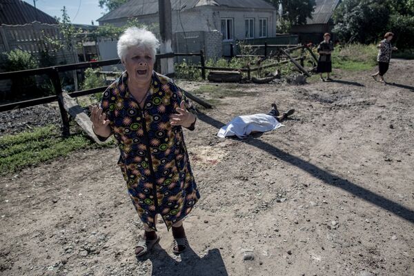 Последствия артобстрела Славянска украинскими военными - Sputnik Таджикистан