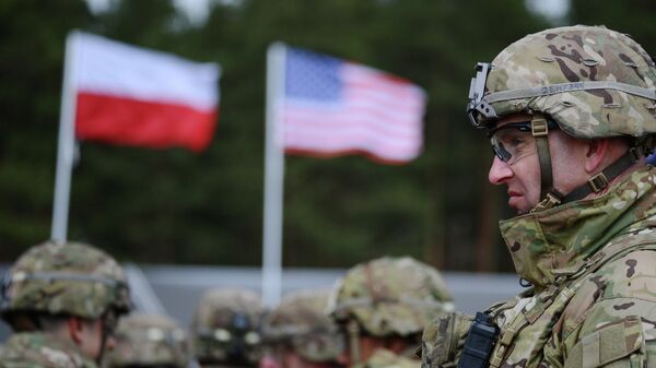 Церемония приветствия многонационального батальона НАТО под руководством США в польском Ожише - Sputnik Тоҷикистон