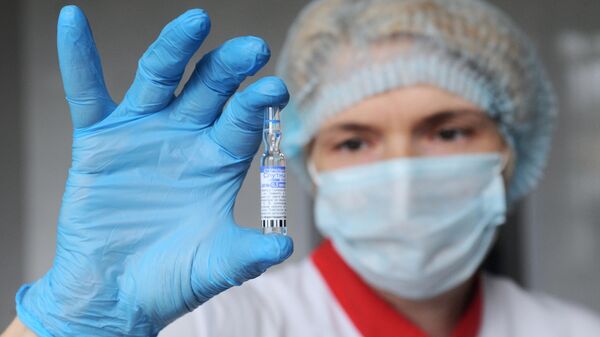 Вакцинация от Covid-19 сотрудников предприятия ПАО Пигмент в Тамбове - Sputnik Таджикистан