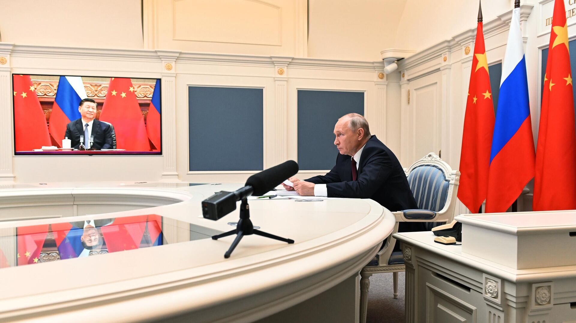 Президент РФ В. Путин провел беседу с председателем КНР Си Цзиньпином - Sputnik Таджикистан, 1920, 16.12.2021