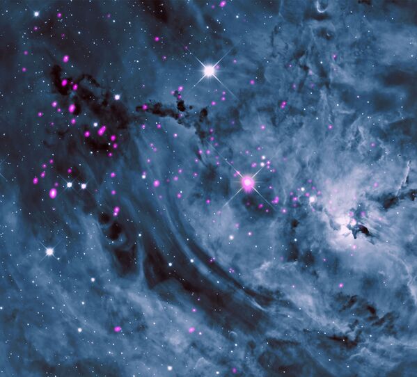 Гигантское межпланетное облако из газа и пыли, известное как NGC 6523, в котором рождаются звезды. Находится на расстоянии около 4000 световых лет от Земли. - Sputnik Таджикистан