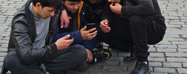 Мигранты на Красной площади - Sputnik Тоҷикистон