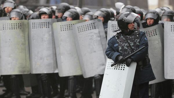 Полиция, протесты в Казахстане - Sputnik Таджикистан