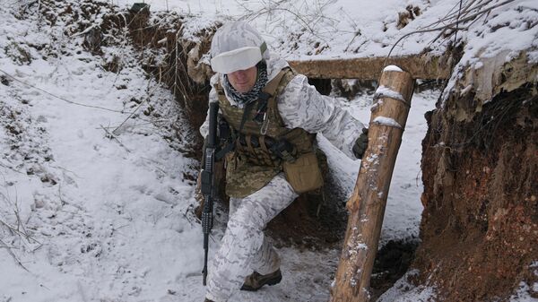 Украинский военный на границе - Sputnik Таджикистан