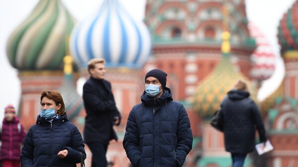 Туристы гуляют по Красной площади в Москве - Sputnik Тоҷикистон