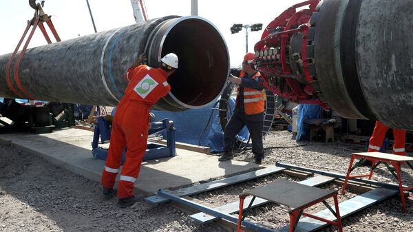  Рабочие на строительной площадке газопровода Северный поток — 2 - Sputnik Таджикистан