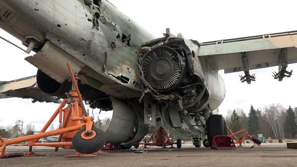 Кадры подбитого Су-25 и комментарий летчика, прикрывавшего его вывод из зоны атаки - Sputnik Таджикистан