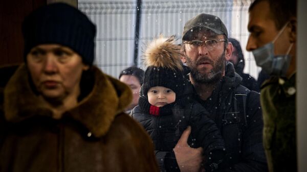 Эвакуация граждан из Херсонской области в Крым - Sputnik Таджикистан