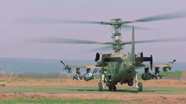 Минобороны показали кадры работы вертолетов Ка-52 - Sputnik Тоҷикистон