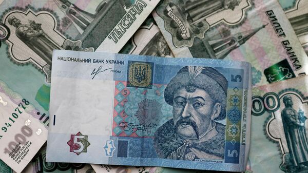 Денежные купюры и монеты России и Украины - Sputnik Таджикистан