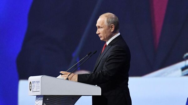 Президент РФ В. Путин, архивное фото - Sputnik Тоҷикистон