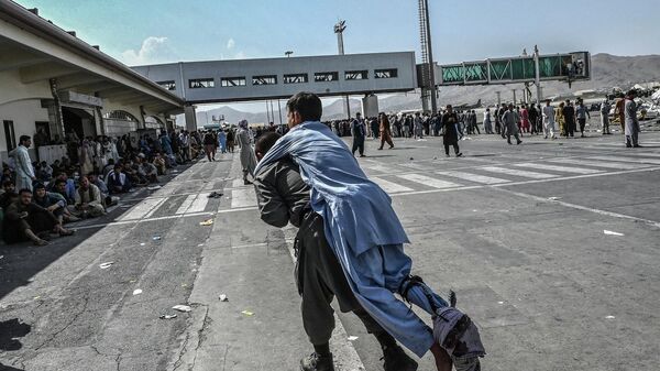 Фотографии эвакуации афганских граждан и вид сегодня на Кабульский аэропорт - Sputnik Тоҷикистон